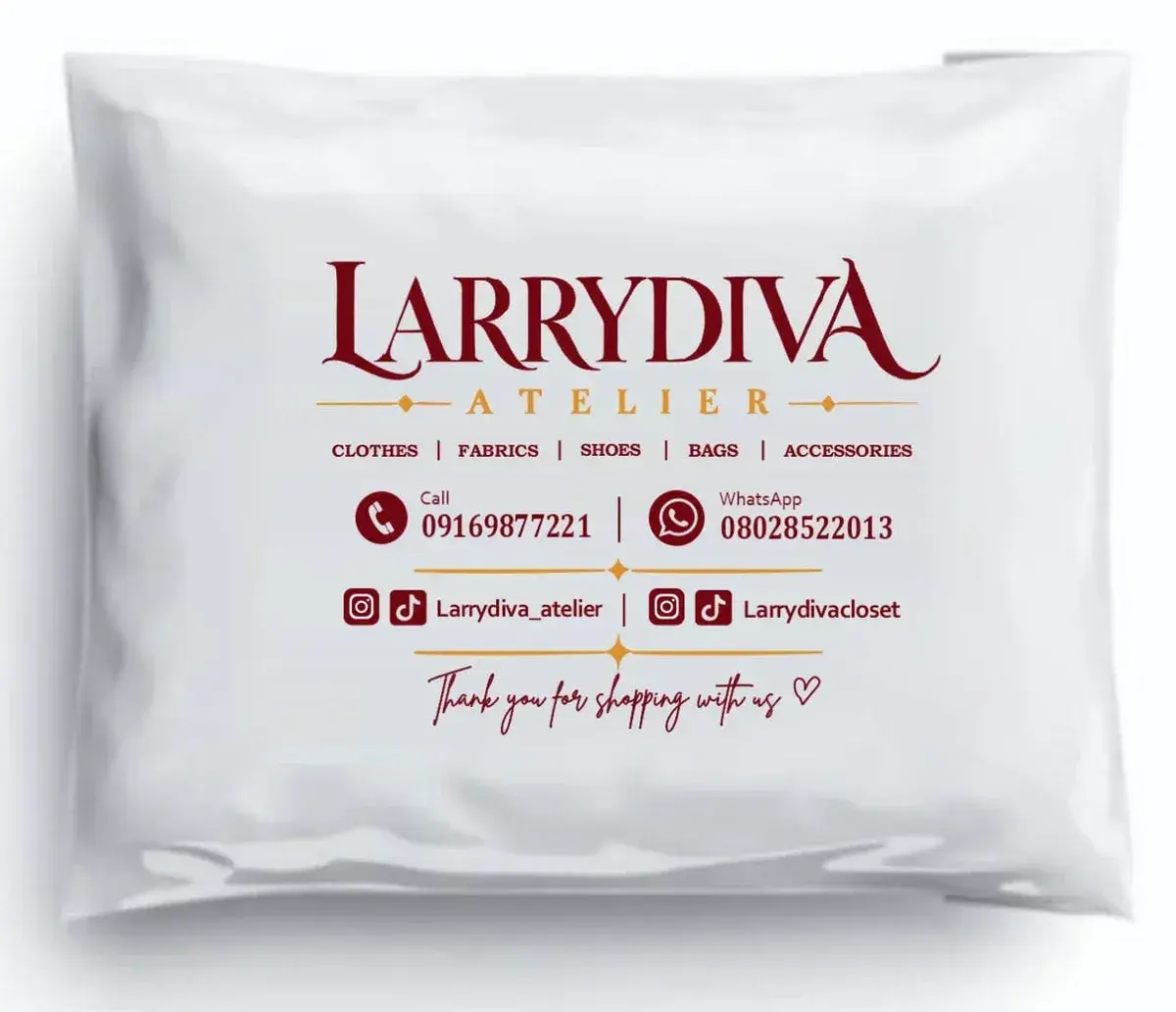 White courier bag printed with the Larrydiva Atelier logo in maroon and gold, for a Nigerian clothing and accessories brand